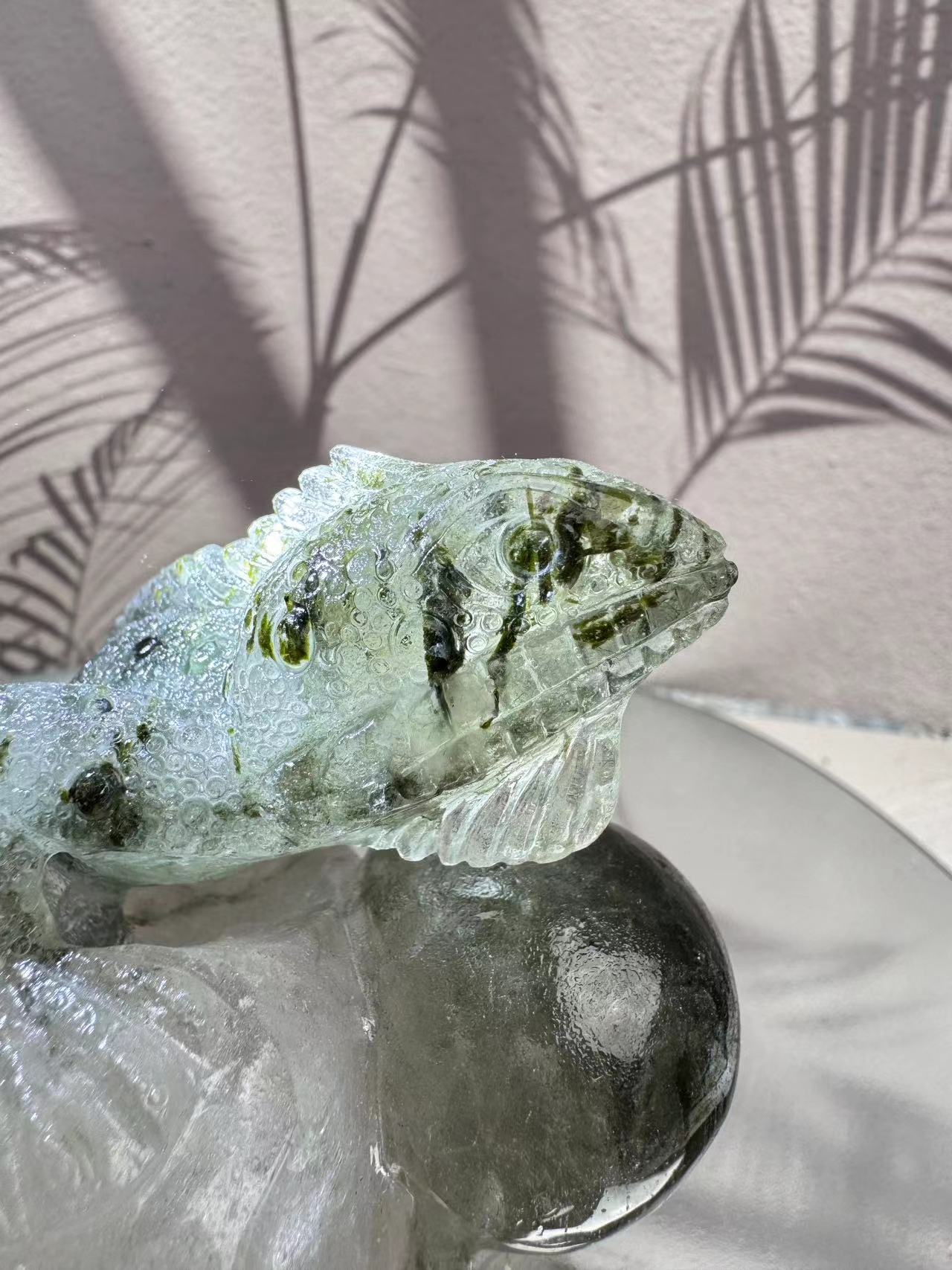 Green tourmaline crystal engraved lizard