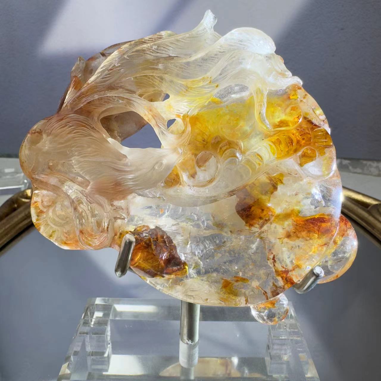 A fox carved from yellow healing crystal.