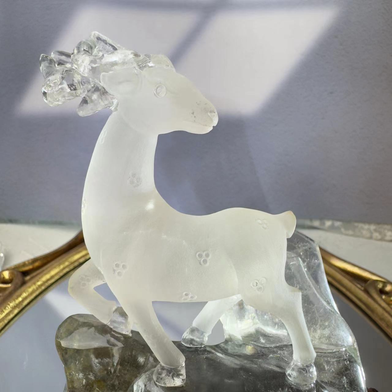 A deer carved from chlorite crystal. A chlorite crystal from Brazil was hand-carved and polished to look like a deer.