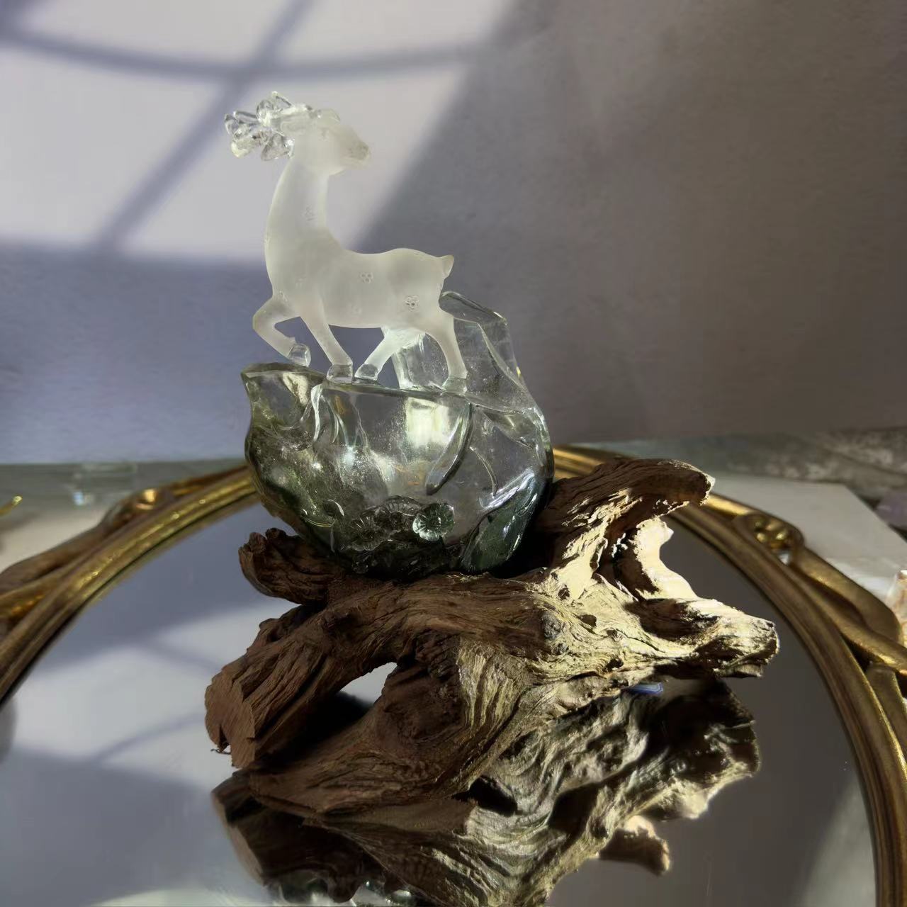 A deer carved from chlorite crystal. A chlorite crystal from Brazil was hand-carved and polished to look like a deer.