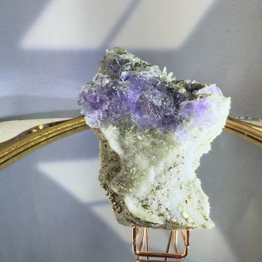 Crystal and purple fluorite and pyrite intergrowth. Produced in Yaogangxian mining area, Hunan, China.