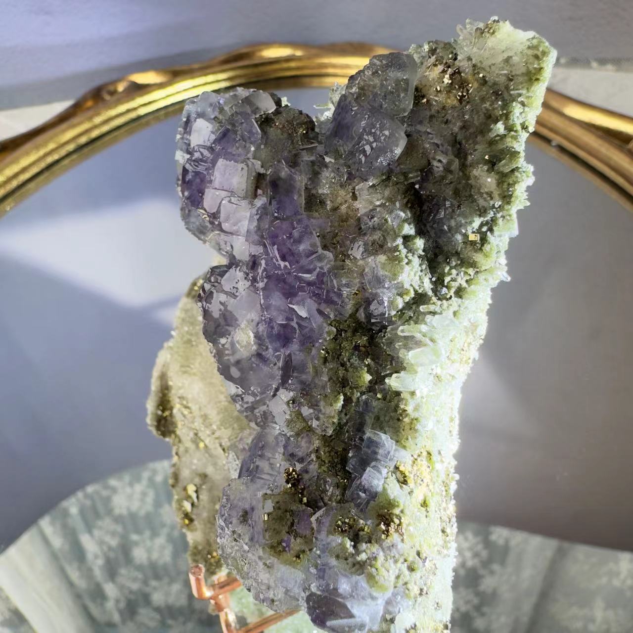 Crystal and purple fluorite and pyrite intergrowth. Produced in Yaogangxian mining area, Hunan, China.