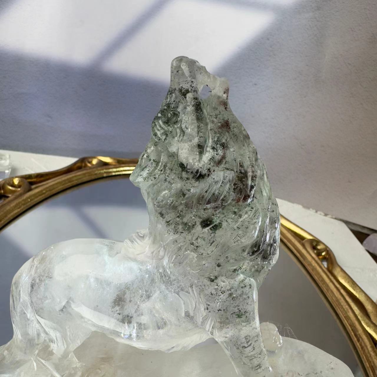 Wolf carved from chlorite crystal.