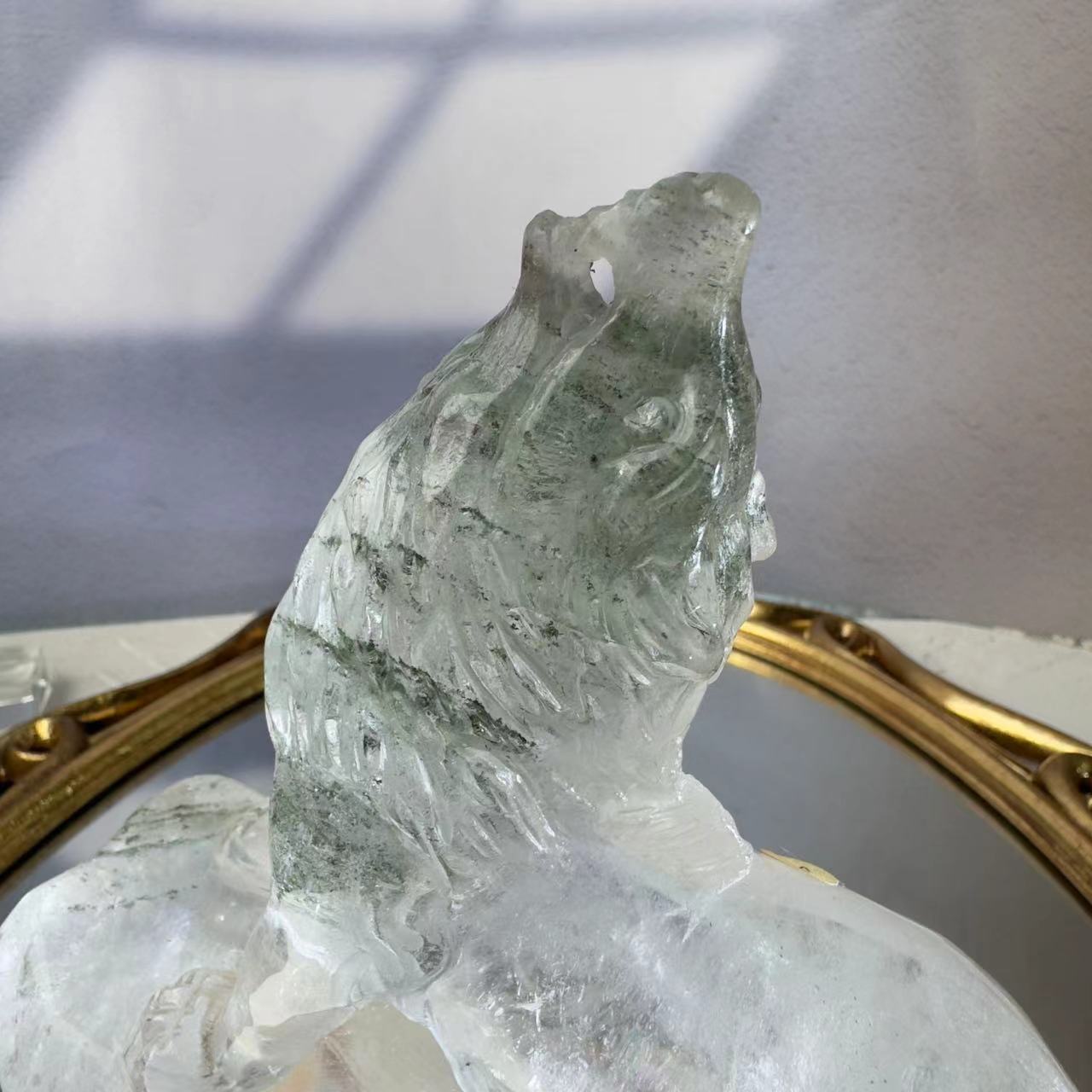 Wolf carved from chlorite crystal.