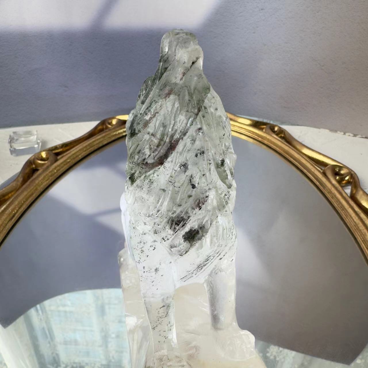 Wolf carved from chlorite crystal.