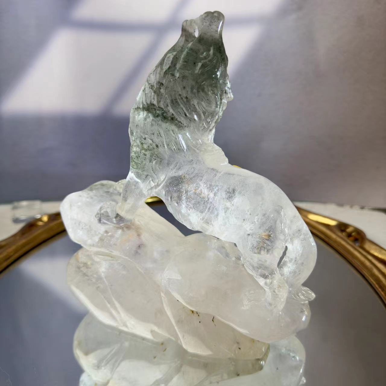 Wolf carved from chlorite crystal.