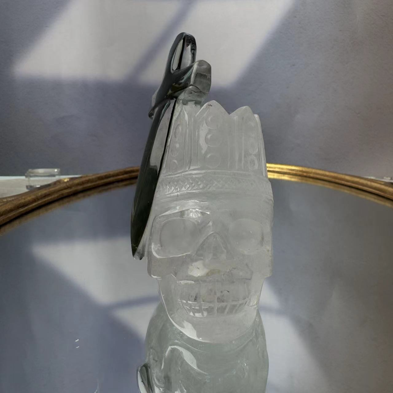 The king's chlorite sword. Crystal skull with crown.