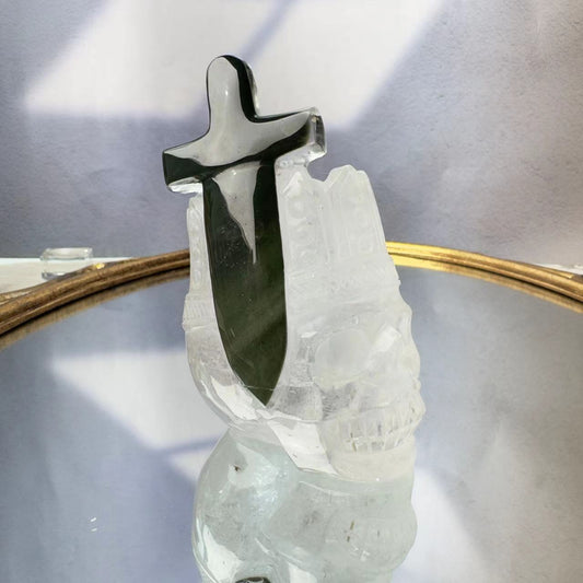 The king's chlorite sword. Crystal skull with crown.