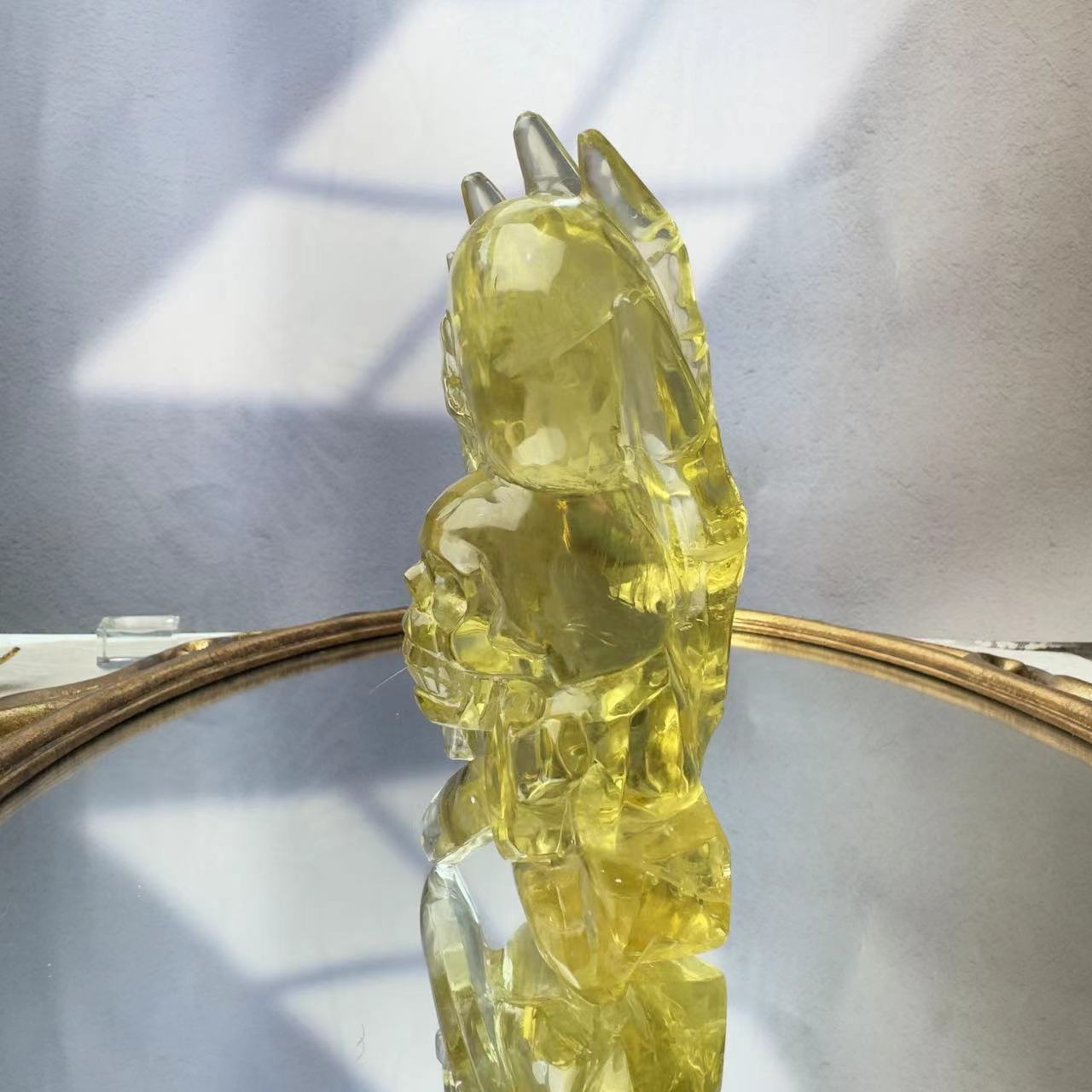 Skull carved from yellow crystal.