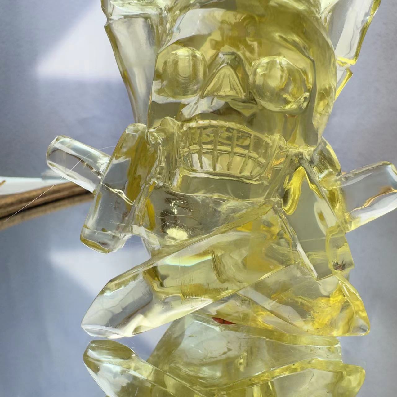 Skull carved from yellow crystal.