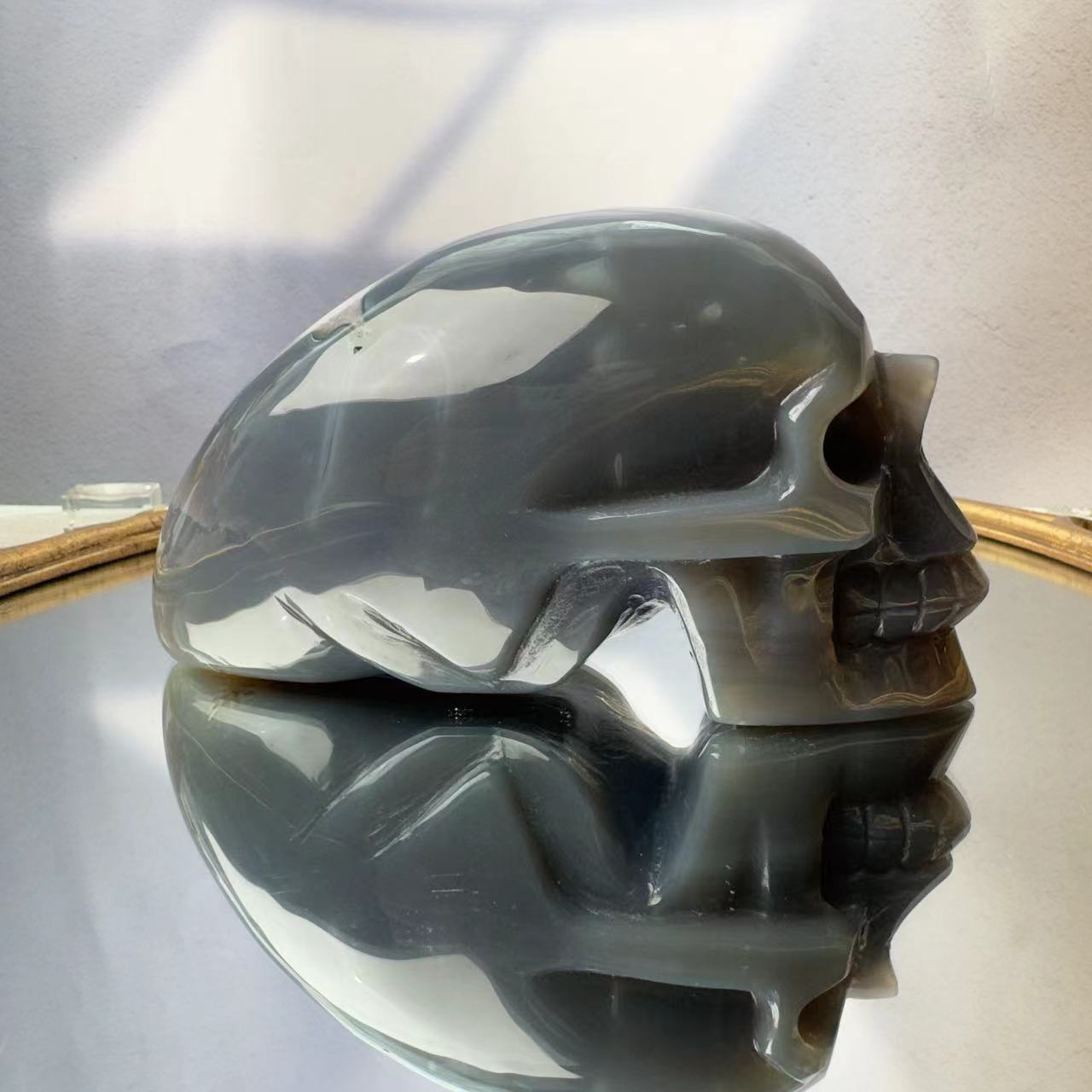 Natural agate crystal carved skull.