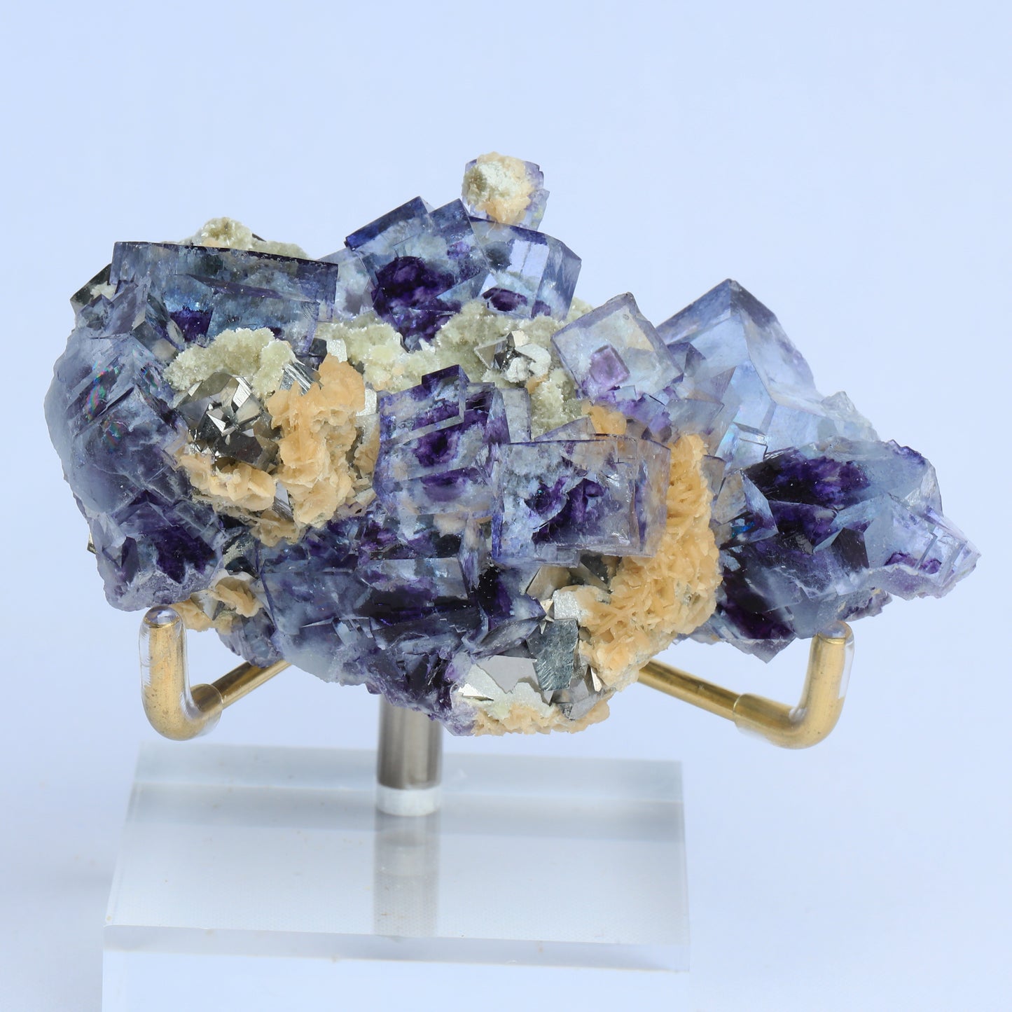 Symbiosis of blue window fluorite calcite pyrite.