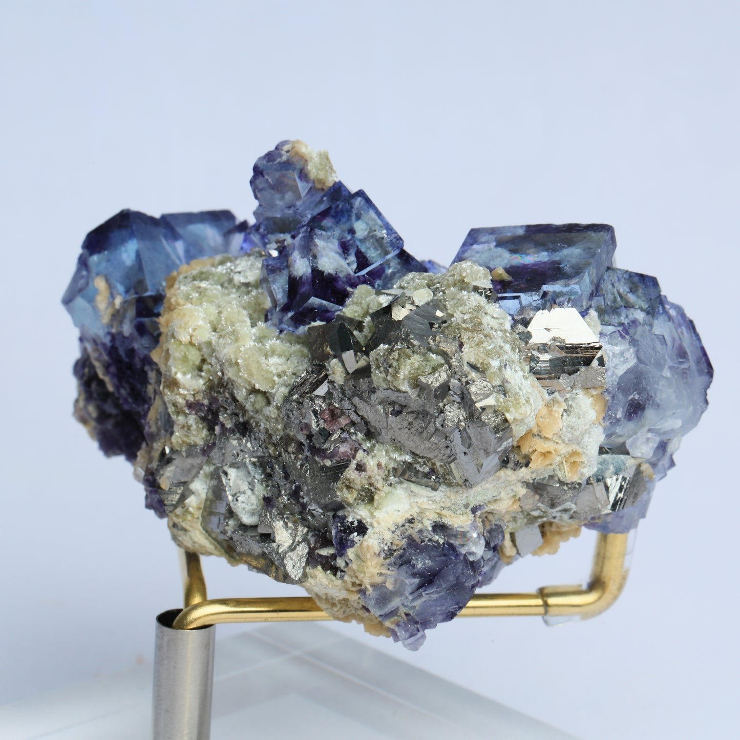 Symbiosis of blue window fluorite calcite pyrite.