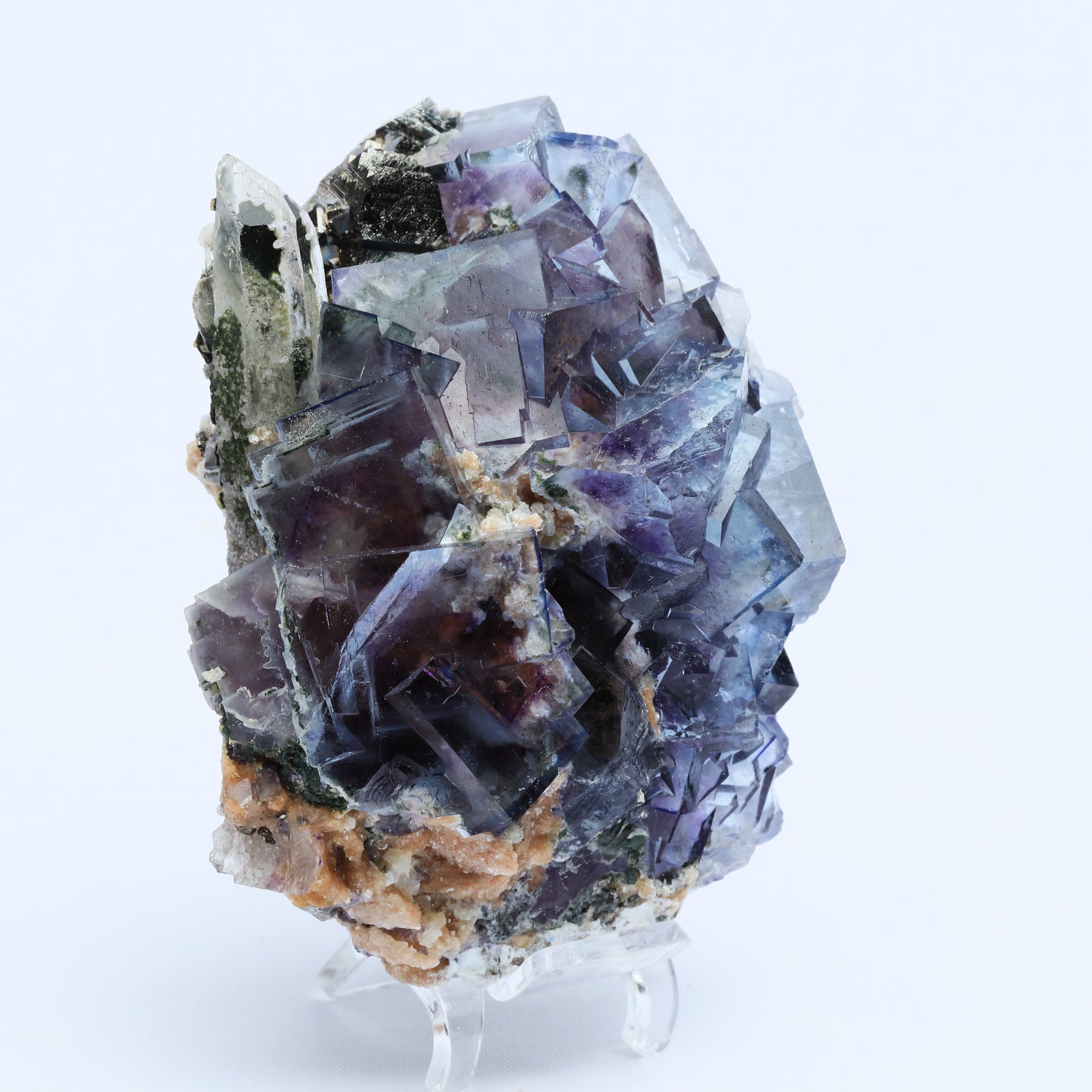 Violet fluorite crystal calcite chalcopyrite symbiosis.