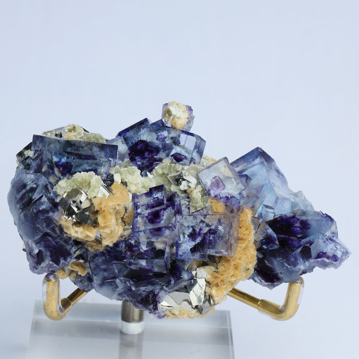 Symbiosis of blue window fluorite calcite pyrite.