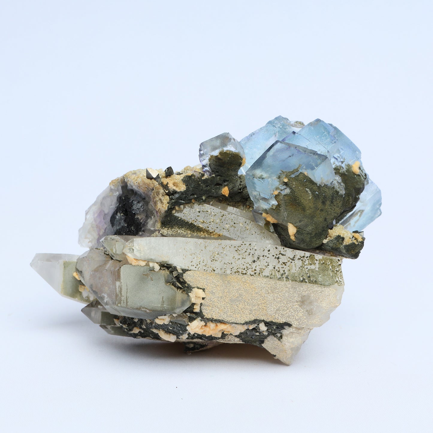 Symbiosis of fluorite crystal, calcite and black tungsten.