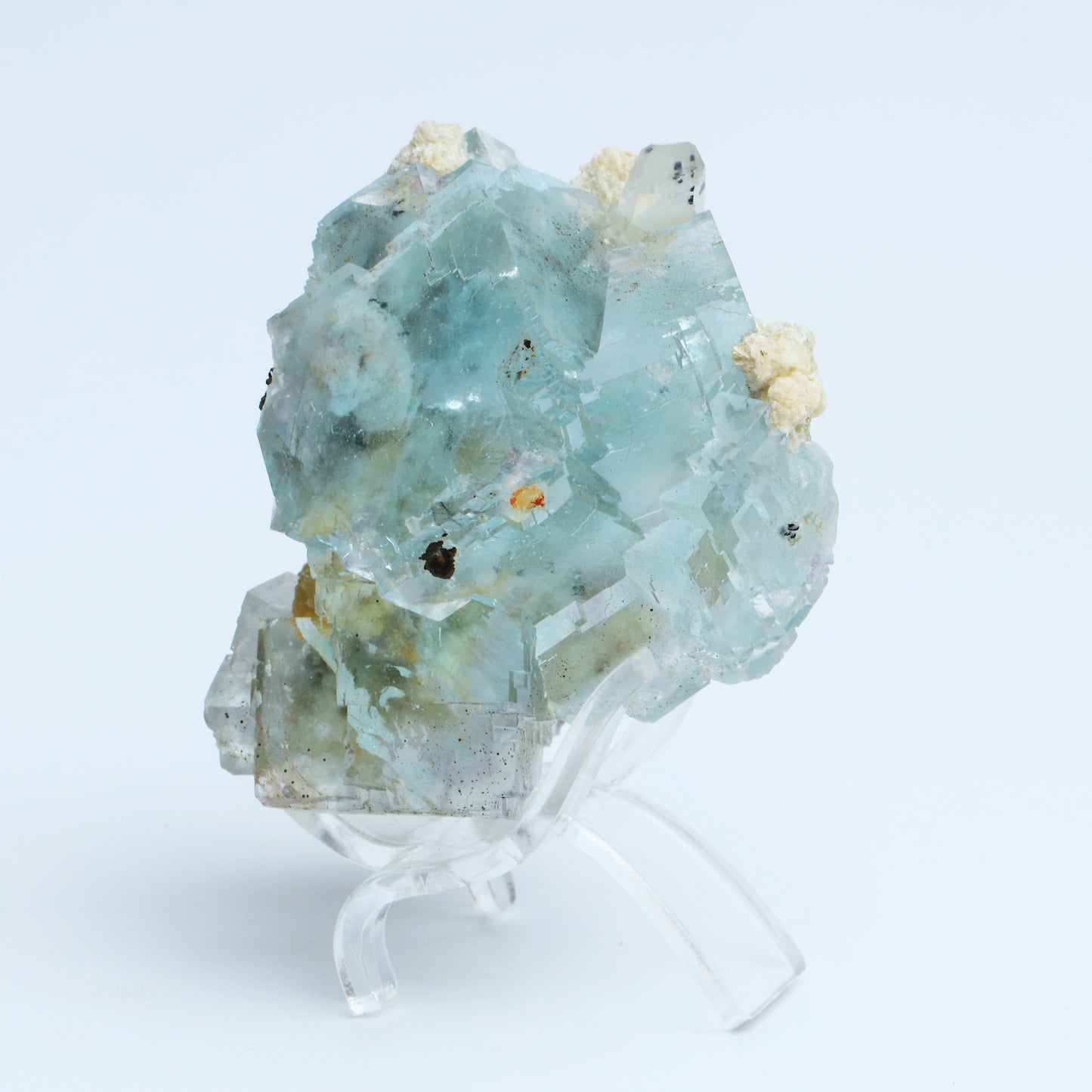 Symbiosis of blue fluorite and calcite crystals.