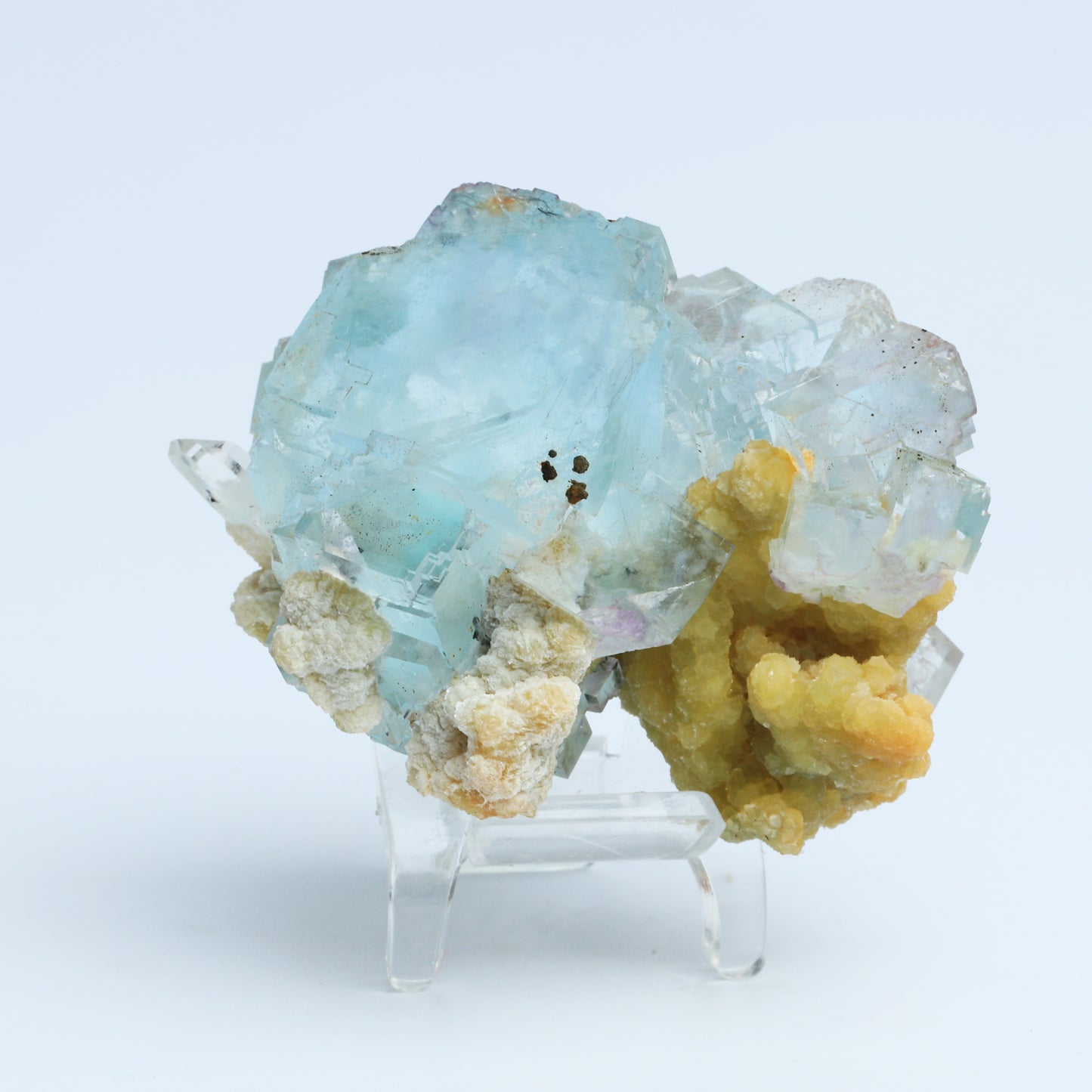 Symbiosis of blue fluorite and calcite crystals.